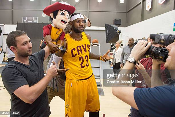 LeBron James of the Cleveland Cavaliers records a promotional video for the team during media day at Cleveland Clinic Courts on September 26, 2014 in...