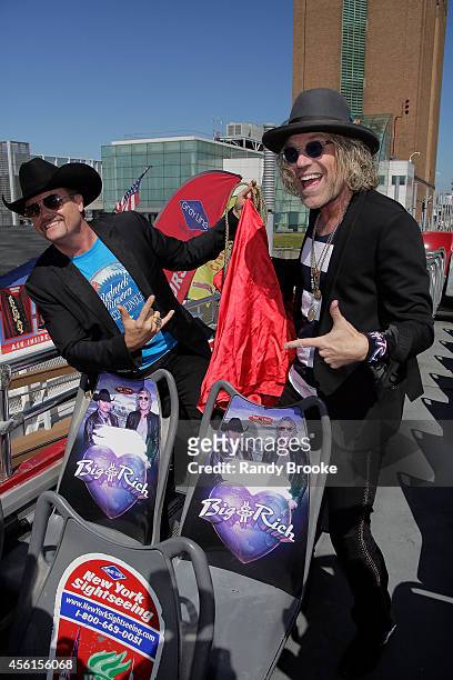 John Rich and Big Kenny unveil their seats aboard the " Ride of Fame" at Pier 78 on September 26, 2014 in New York City.