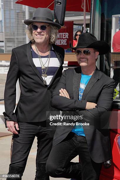 Big Kenny and John Rich pose before their tour on "The Ride of Fame" at Pier 78 on September 26, 2014 in New York City.
