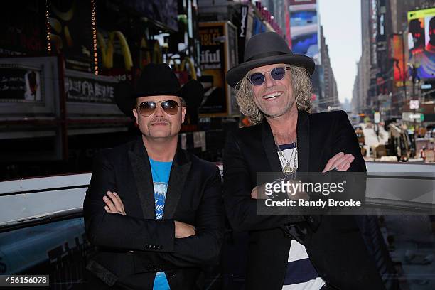The Big & Rich duo, John Rich and Big Kenny greet Times Square aboard the Ride of Fame at Pier 78 on September 26, 2014 in New York City.