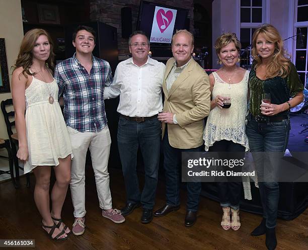Jessica Ceene, Chris Fisher, Pete Fisher, Troy Tomlinson, Sylvia Keith Tomlinson and Hope Fisher attend the MusiCares House Concert - Hosted by Pete...