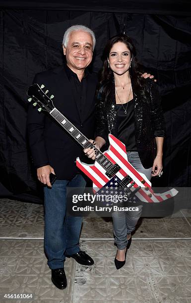 Founder of Rock in Rio Roberto Medina and vice president of Rock in Rio Roberta Medina pose during the Rock In Rio USA event in Times Square on...