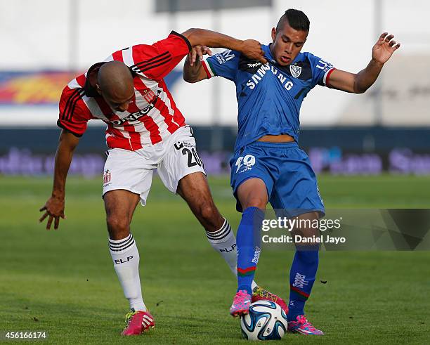 Diego Daniel Vera, of Estudiantes, and Lucas Romero, of Velez Sarsfield, vies for the ball during a match between Estudiantes and Velez Sarsfield as...