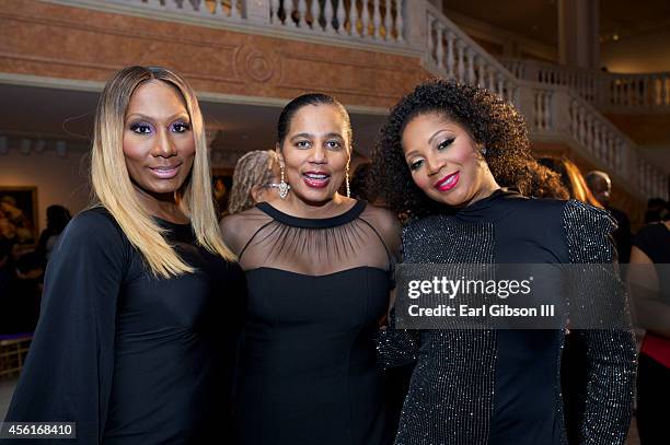 Towanda Braxton, A. Shuanise Washington, Trina Braxton pose for a photo at the The Sojourner Truth Women's Leadership Reception at Walter E....