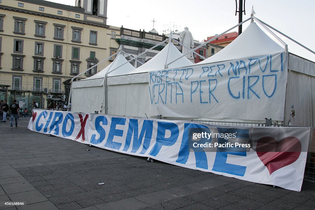 Hundreds of supporters gathered at Piazza Dante with banners...