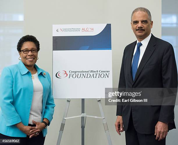 Representative Marcia Fudge and Attorney General Eric Holder pose for a photo at the Congressional Black Caucus Foundation Inc. 44th Annual...