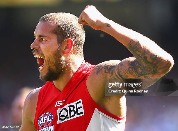 Lance Franklin of the Swans celebrates kicking a goal during the 2014 AFL Grand Final match between the Sydney Swans and the Hawthorn Hawks at...
