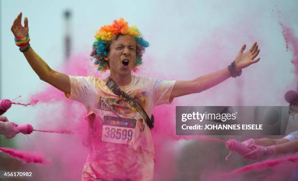 People participate in the annual Color Run in Shanghai on September 27, 2014. The Color Run is a five kilometre race without winners where...