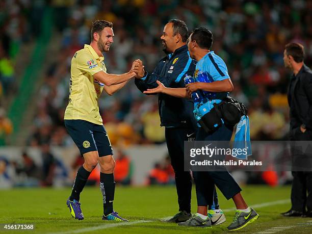 Miguel Layun celebrates after scoring his third goal of the game during a match between Santos Laguna and America as part of 10th round Apertura 2014...