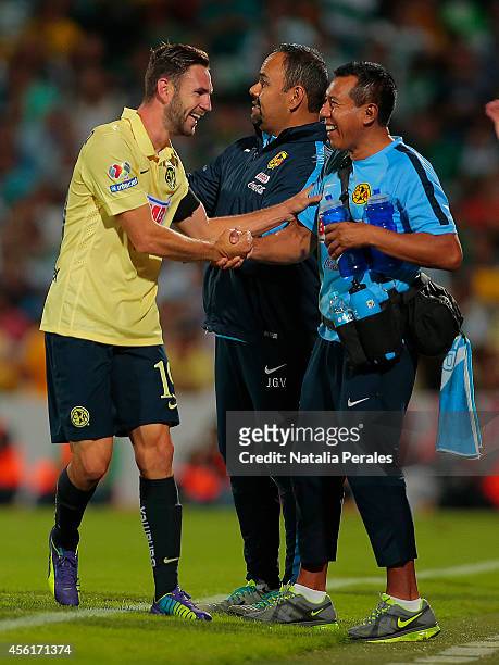 Miguel Layun celebrates after scoring his third goal of the game during a match between Santos Laguna and America as part of 10th round Apertura 2014...