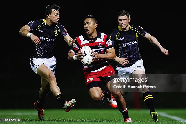 Toni Pulu of Counties makes a break during the round seven ITM Cup match between Counties Manukau and Wellington on September 27, 2014 in Pukekohe,...