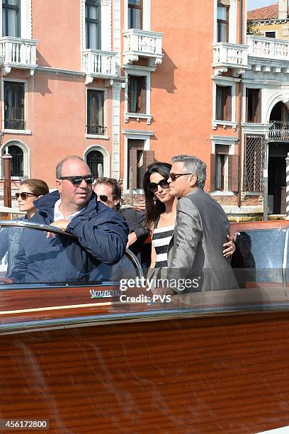 George Clooney, Amal Alamuddin, Rande Gerber and Cindy Crawford arrive in Venice on September 26, 2014 in Venice, Italy. George Clooney is set to...