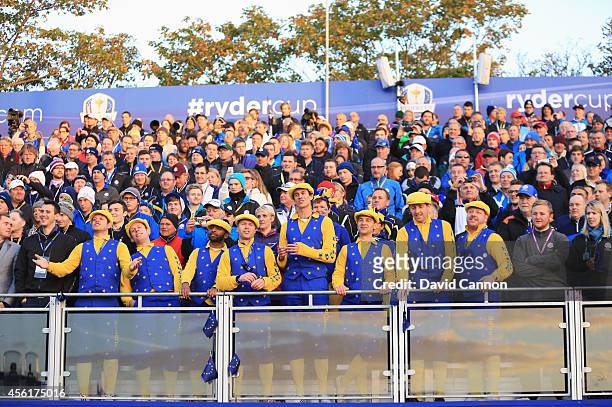 Fans cheer on the first tee before the start of the Morning Fourballs of the 2014 Ryder Cup on the PGA Centenary course at the Gleneagles Hotel on...