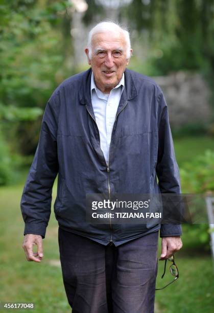 French founder of the Communaute de l'Arche Jean Vanier poses at home on September 23, 2014 in Trosly-Breuil. The association dedicated to...