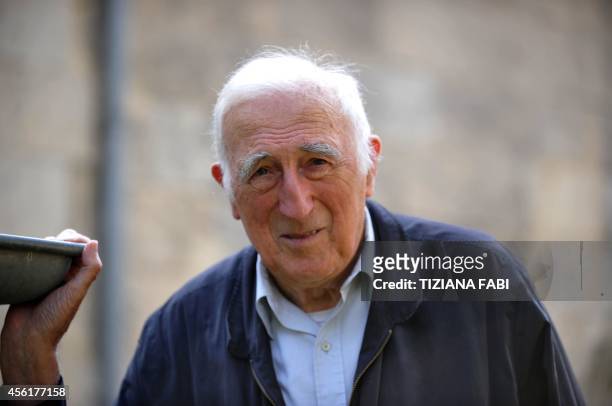 French founder of the Communaute de l'Arche Jean Vanier poses at home on September 23, 2014 in Trosly-Breuil. The association dedicated to...