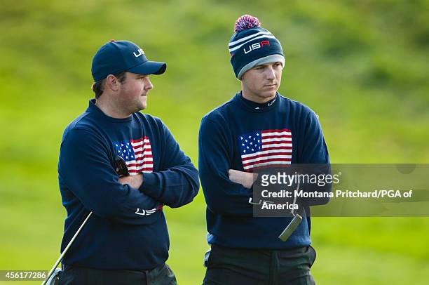 Teammates Patrick Reed and Jordan Spieth of the United States stand on hole four during the fourball matches for the 40th Ryder Cup at Gleneagles, on...