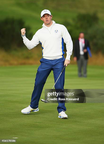 Rory McIlroy of Europe celebrates his birdie putt on the 6th hole during the Morning Fourballs of the 2014 Ryder Cup on the PGA Centenary course at...