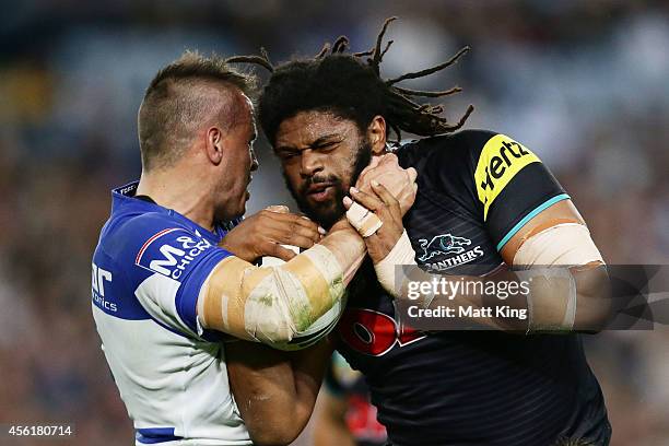 Jamal Idris of the Panthers is tackled during the NRL Second Preliminary Final match between the Penrith Panthers and the Canterbury Bulldogs at ANZ...