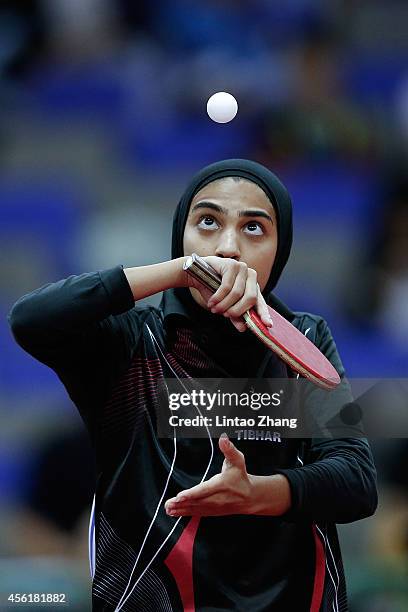 Maryam S B A Abdulraheem of Kuwait competing against Kim Jong of North Korea in Table Tennis Women's Team Preliminary Round Group D during day eight...