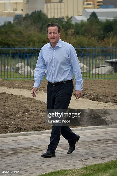 Prime Minister David Cameron during a visit to the new Taylor Wimpy Great Western Park housing estate on September 27 in Didcot, Oxfordshire,...