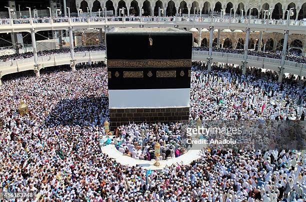 Muslim pilgrims gathering for the annual Hajj pilgrimage circle counterclockwise toward the Kaaba, Islam's holiest shrine, at Masjid al-Haram in the...
