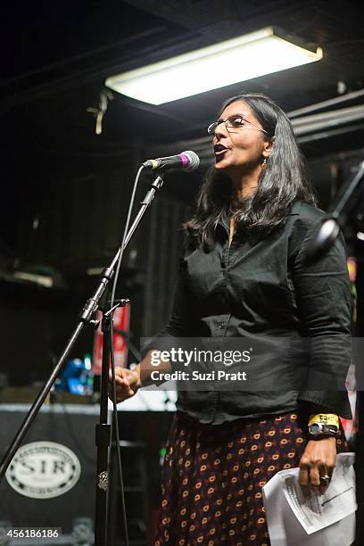 Seattle City Council Member Kshama Sawant speaks at the "15 Now" Benefit Show at El Corazn on September 26, 2014 in Seattle, Washington.