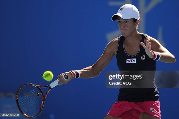 Silvia Soler-Espinosa of Spain returns a shot against Varvara Lepchenko of the United States during day one of the China Open at the China National...