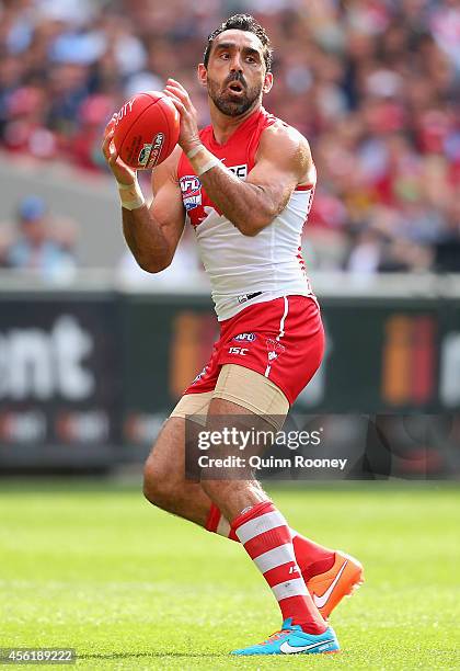 Adam Goodes of the Swans marks during the 2014 AFL Grand Final match between the Sydney Swans and the Hawthorn Hawks at Melbourne Cricket Ground on...