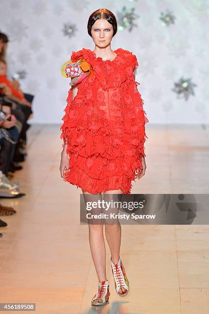 Model walks the runway during the Tsumori Chisato show as part of Paris Fashion Week Womenswear Spring/Summer 2015 on September 27, 2014 in Paris,...