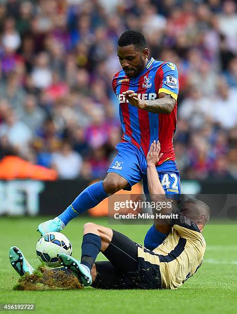 Jason Puncheon of Crystal Palace in action against Paul Konchesky of Leicester City during the Barclays Premier League match between Crystal Palace...