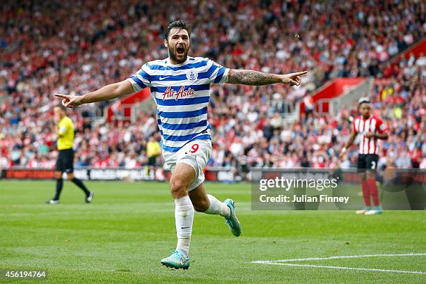 Charlie Austin of QPR celebrates scoring their first goal during the Barclays Premier League match between Southampton and Queens Park Rangers at St...