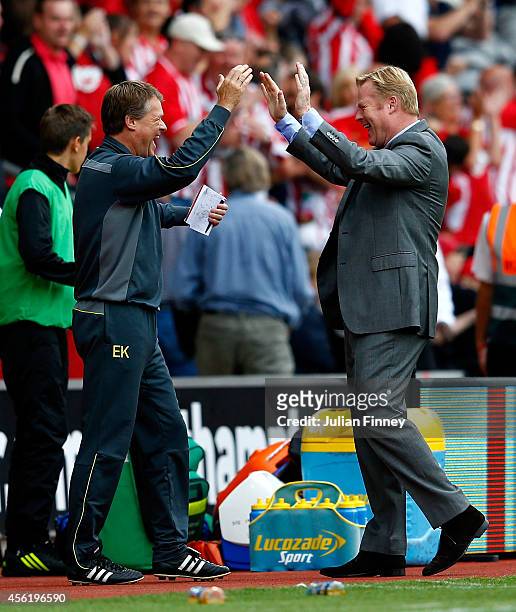 Manager Ronald Koeman of Southampton celebrates their victory with assitant manager Erwin Koeman of Southampton during the Barclays Premier League...