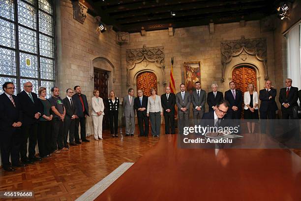 Catalonia's President Artur Mas signing the decree of announcement for the 9th November's self-determination Catalonian independence referendum at...