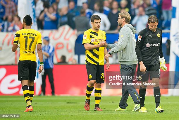 Borussia Dortmund's Pierre-Emerick Aubameyang, head coach Juergen Klopp with his player Sokratis Papastathopoulos and goal keeper Roman Weidenfeller...
