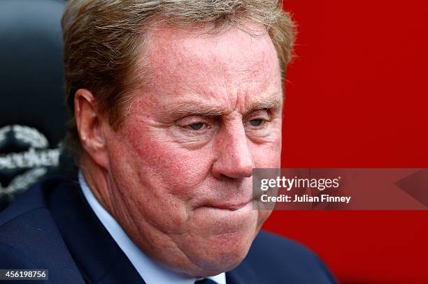 Harry Redknapp the manager of QPR looks on during the Barclays Premier League match between Southampton and QPR at St Mary's Stadium on September 27,...