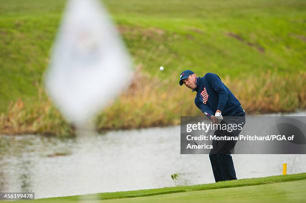 Matt Kuchar of the United States chips onto the green during the foursome matches for the 40th Ryder Cup at Gleneagles, on September 27, 2014 in...