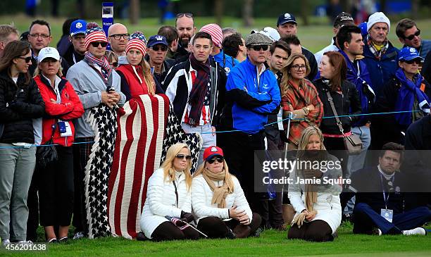 Amy Mickelson, Kandi Mahan and Tabitha Furyk watch during the Afternoon Foursomes of the 2014 Ryder Cup on the PGA Centenary course at the Gleneagles...
