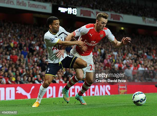 Calum Chambers of Arsenal is fouled by Aaron Lennon of Tottenham during the Barclays Premier League match between Arsenal and Tottenham Hotspur at...