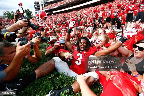 Todd Gurley of the Georgia Bulldogs celebrates their 35-32 win over the Tennessee Volunteers at Sanford Stadium on September 27, 2014 in Athens,...