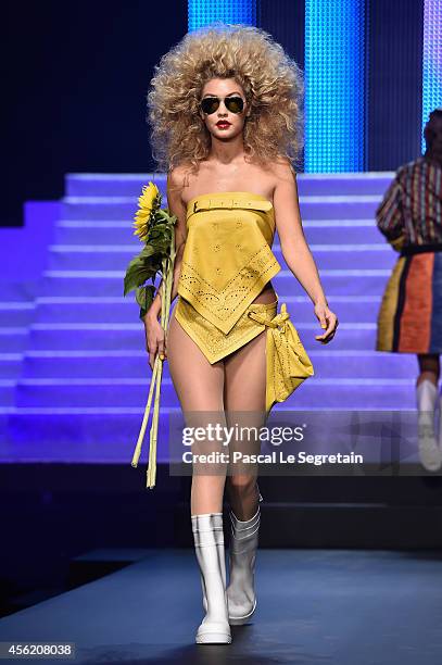Model Gigi Hadid walks the runway during the Jean Paul Gaultier show as part of the Paris Fashion Week Womenswear Spring/Summer 2015 on September 27,...