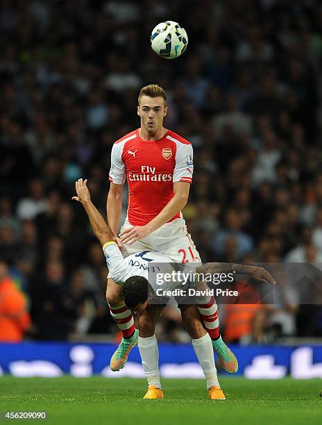 Calum Chambers of Arsenal challenges Aaron Lennon of Tottenham during the Barclays Premier League match between Arsenal and Tottenham Hotspur at...