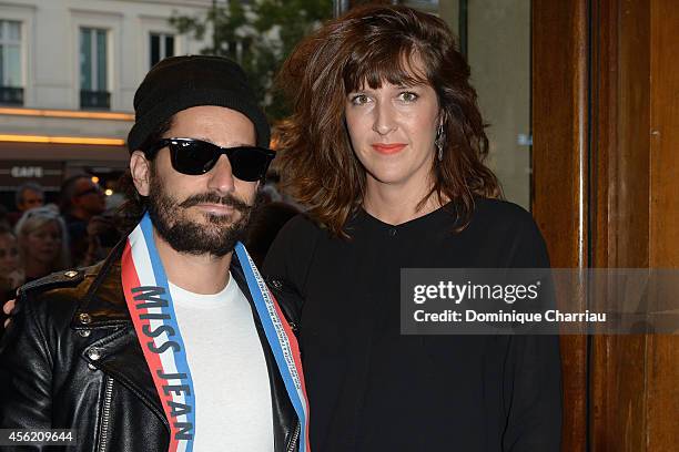 Sylvain Quimene and Daphne Burki attend the Jean Paul Gaultier show as part of the Paris Fashion Week Womenswear Spring/Summer 2015 on September 27,...