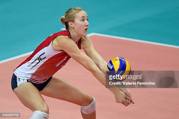 Kimberly Hill of USA receives during the FIVB Women's World Championship pool C match between USA and Thailand on September 27, 2014 in Verona, Italy.