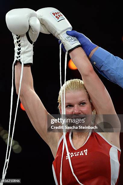 Melanie Mueller celebrates after winning her fight against Jordan Carver during the 'Das Grosse Prosieben Promiboxen' tv show at Castello on...