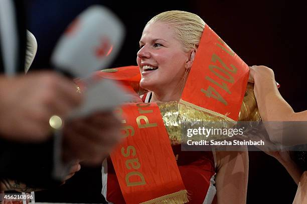 Melanie Mueller celebrates after winning her fight against Jordan Carver during the 'Das Grosse Prosieben Promiboxen' tv show at Castello on...