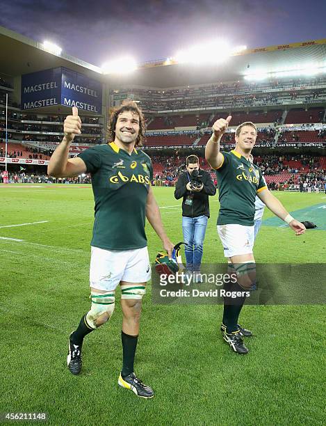 Victor Matfield and Bakkies Botha of South Africa celebrate after their victory during The Rugby Championship match between the South African...