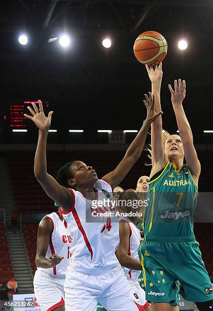 Penny Taylor of Australia in action against Leidys Oquendo of Cuba during the 2014 FIBA World Championship For Women Group C basketball match between...