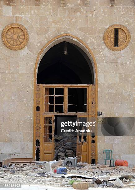 Door of Umayyad Mosque, destroyed after clashes between Asad regime forces and Syrian opponents, is seen in Aleppo, Syria on September 27, 2014.