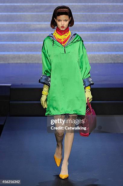 Model walks the runway at the Jean Paul Gaultier Spring Summer 2015 fashion show during Paris Fashion Week on September 27, 2014 in Paris, France.