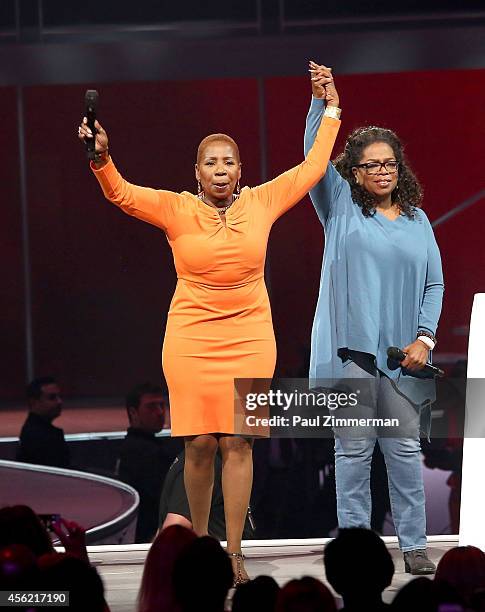 Iyanla Vanzant and Oprah Winfrey speak at Oprah's The Life You Want Weekend at Prudential Center on September 27, 2014 in Newark, New Jersey.